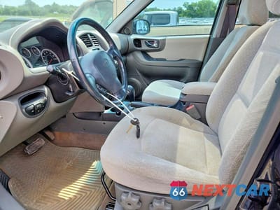 Zdjęcie 7 z 14 samochodu: 2005 HYUNDAI SANTA FE GLS VIN:KM8SC13E65U877827 - miniatura
