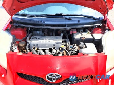 Zdjęcie 11 z 12 samochodu: 2009 TOYOTA YARIS BASE VIN:JTDJT903X95237122 - miniatura