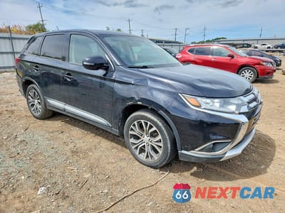 Czwarte zdjęcie samochodu z boku: 2016 MITSUBISHI OUTLANDER SE VIN:JA4AD3A34GZ020206 - miniatura