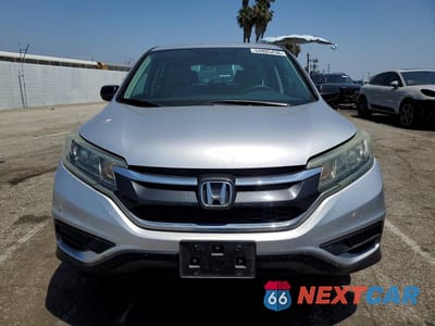 Piąte zdjęcie samochodu w środku: 2015 HONDA CR-V LX VIN:2HKRM3H30FH559328 - miniatura