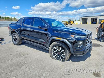 Czwarte zdjęcie samochodu z boku: 2025 GMC CANYON AT4 VIN:1GTP2DEK9S1228893 - miniatura