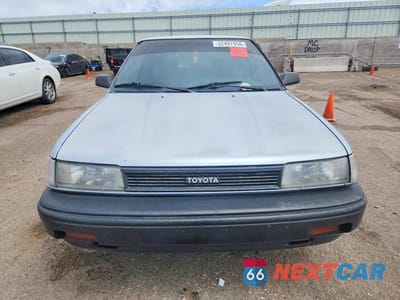 Piąte zdjęcie samochodu w środku: 1990 TOYOTA COROLLA DLX VIN:1NXAE94A6LZ086839 - miniatura