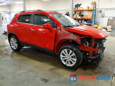 Czwarte zdjęcie samochodu z boku: 2018 CHEVROLET TRAX PREMIER VIN:3GNCJRSB8JL262485 - miniatura