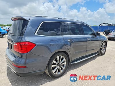 Trzecie zdjęcie samochodu z tyłu: 2016 MERCEDES-BENZ GL 450 4MATIC VIN:4JGDF6EE5GA671025 - miniatura