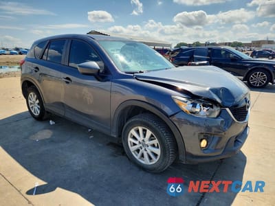 Czwarte zdjęcie samochodu z boku: 2014 MAZDA CX-5 TOURING VIN:JM3KE2CYXE0319766 - miniatura