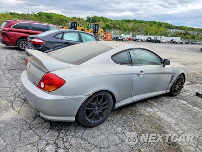 Trzecie zdjęcie samochodu z tyłu: 2003 HYUNDAI TIBURON GT VIN:KMHHN65F23U014608 - miniatura