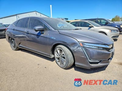 Czwarte zdjęcie samochodu z boku: 2018 HONDA CLARITY TOURING VIN:JHMZC5F32JC800603 - miniatura