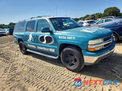 Czwarte zdjęcie samochodu z boku: 2004 CHEVROLET SUBURBAN C1500 VIN:1GNEC16T64J199373 - miniatura