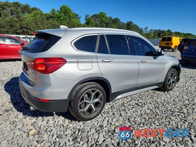 Trzecie zdjęcie samochodu z tyłu: 2019 BMW X1 SDRIVE28I VIN:WBXHU7C57K5L10937 - miniatura