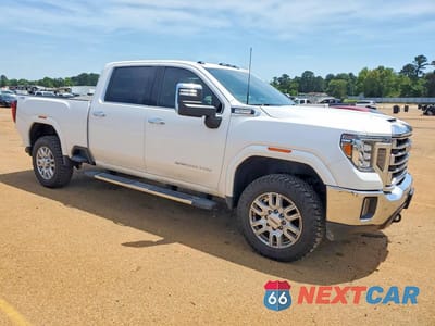 Czwarte zdjęcie samochodu z boku: 2023 GMC SIERRA K2500 SLT VIN:1GT49NEY5PF130463 - miniatura