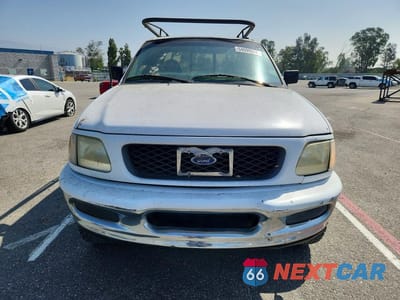 Piąte zdjęcie samochodu w środku: 1997 FORD F150 VIN:1FTEX18L4VKC70348 - miniatura