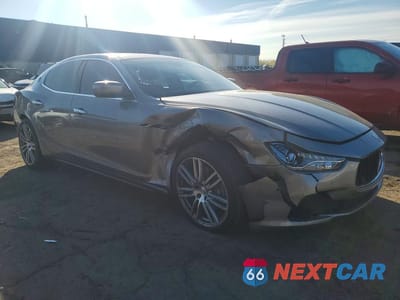 Czwarte zdjęcie samochodu z boku: 2014 MASERATI GHIBLI VIN:ZAM57XSA1E1093477 - miniatura