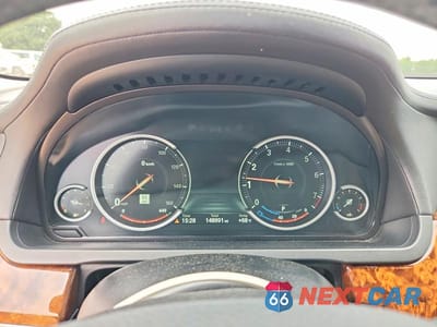 Zdjęcie 9 z 13 samochodu: 2014 BMW 750 LI VIN:WBAYE8C52ED134631 - miniatura