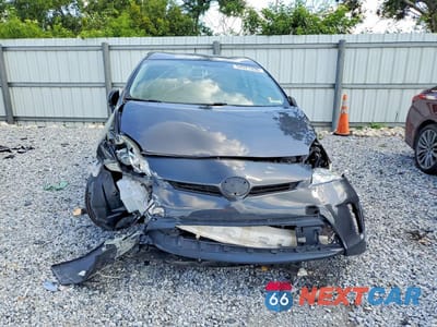 Piąte zdjęcie samochodu w środku: 2015 TOYOTA PRIUS TWO VIN:JTDKN3DU9F1896794 - miniatura