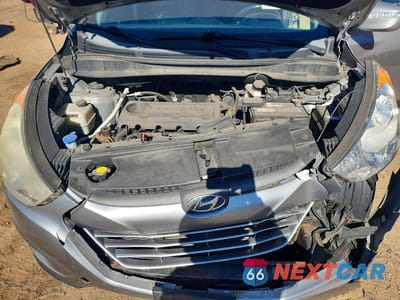 Zdjęcie 11 z 12 samochodu: 2012 HYUNDAI TUCSON GLS VIN:KM8JUCAC2CU529462 - miniatura