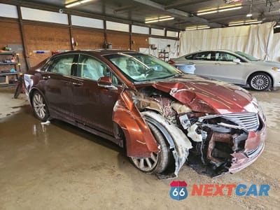 Czwarte zdjęcie samochodu z boku: 2015 LINCOLN MKZ VIN:3LN6L2J92FR614031 - miniatura