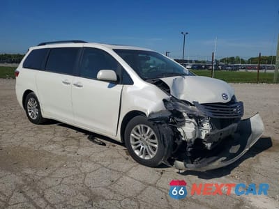 Czwarte zdjęcie samochodu z boku: 2015 TOYOTA SIENNA XLE 8-PASSENGER VIN:5TDYK3DC0FS561534 - miniatura