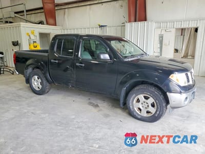 Czwarte zdjęcie samochodu z boku: 2007 NISSAN FRONTIER SE VIN:1N6AD07W77C450334 - miniatura