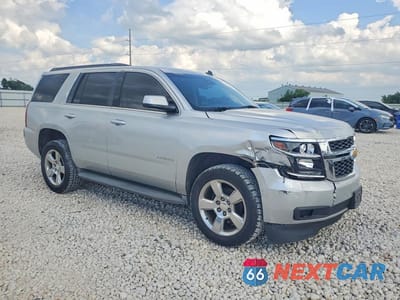 Czwarte zdjęcie samochodu z boku: 2015 CHEVROLET TAHOE VIN:1GNSCBKCXFR247380 - miniatura