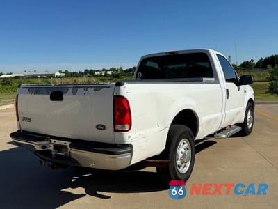 Czwarte zdjęcie samochodu z boku: 2002 FORD F250 SUPER DUTY VIN:1FTNF20L72EC88180 - miniatura