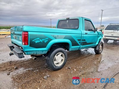 Trzecie zdjęcie samochodu z tyłu: 1992 FORD RANGER VIN:1FTCR11X2NTA03153 - miniatura