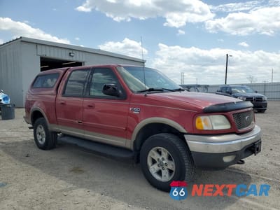 Czwarte zdjęcie samochodu z boku: 2002 FORD F150 SUPERCREW VIN:1FTRW08L72KC07514 - miniatura