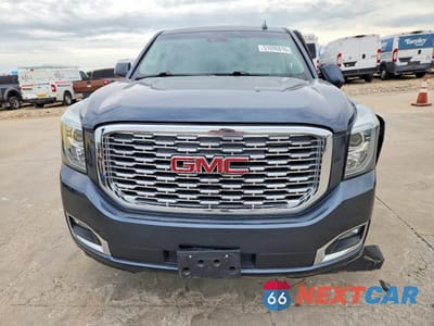 Piąte zdjęcie samochodu w środku: 2019 GMC YUKON DENALI VIN:1GKS1CKJ6KR317054 - miniatura