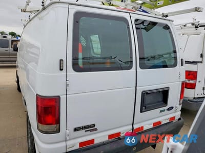 Zdjęcie 6 z 12 samochodu: 2014 FORD ECONOLINE E150 VAN VIN:1FTNE1EW6EDA56048 - miniatura
