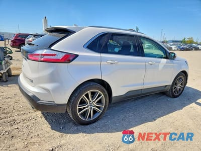 Trzecie zdjęcie samochodu z tyłu: 2019 FORD EDGE TITANIUM VIN:2FMPK4K99KBC62401 - miniatura