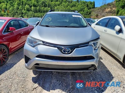 Piąte zdjęcie samochodu w środku: 2018 TOYOTA RAV4 HYBRID LE VIN:JTMRJREV1JD259295 - miniatura