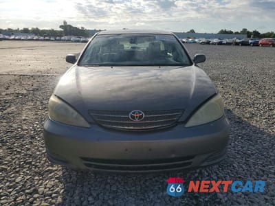 Piąte zdjęcie samochodu w środku: 2003 TOYOTA CAMRY LE VIN:4T1BE32K33U697652 - miniatura