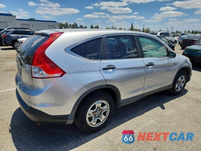 Trzecie zdjęcie samochodu z tyłu: 2012 HONDA CR-V LX VIN:2HKRM3H38CH506775 - miniatura