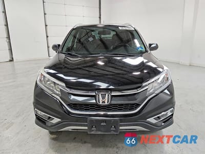 Piąte zdjęcie samochodu w środku: 2015 HONDA CR-V EXL VIN:2HKRM4H71FH687070 - miniatura