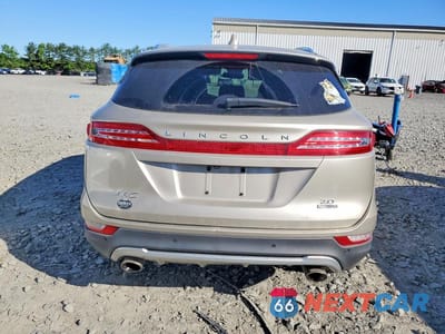 Zdjęcie 6 z 13 samochodu: 2015 LINCOLN MKC VIN:5LMCJ1A90FUJ30285 - miniatura