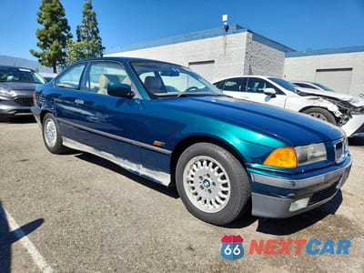 Czwarte zdjęcie samochodu z boku: 1995 BMW 325 IS AUTOMATIC VIN:WBABF4327SEK17821 - miniatura