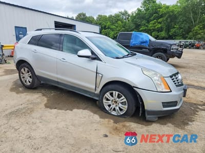 Czwarte zdjęcie samochodu z boku: 2015 CADILLAC SRX VIN:3GYFNAE32FS565740 - miniatura