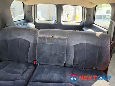 Zdjęcie 10 z 13 samochodu: 2002 CHEVROLET TAHOE C1500 VIN:1GNEC13ZX2R154444 - miniatura