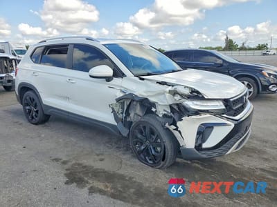 Czwarte zdjęcie samochodu z boku: 2023 VOLKSWAGEN TAOS SE VIN:3VVEX7B21PM314533 - miniatura