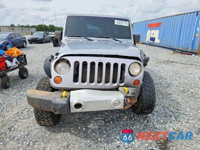 Piąte zdjęcie samochodu w środku: 2013 JEEP WRANGLER UNLIMITED SPORT VIN:1C4BJWDGXDL671227 - miniatura