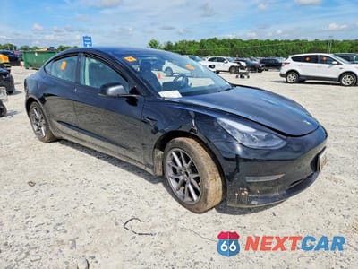 Czwarte zdjęcie samochodu z boku: 2022 TESLA MODEL 3 VIN:5YJ3E1EA0NF206918 - miniatura