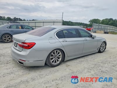 Trzecie zdjęcie samochodu z tyłu: 2018 BMW 740 XE VIN:WBA7J2C50JG938391 - miniatura