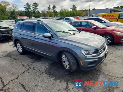 Czwarte zdjęcie samochodu z boku: 2018 VOLKSWAGEN TIGUAN SE VIN:3VV2B7AX8JM123908 - miniatura