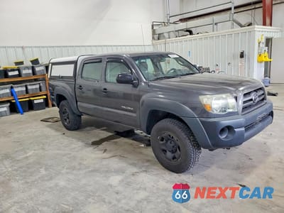 Czwarte zdjęcie samochodu z boku: 2009 TOYOTA TACOMA DOUBLE CAB VIN:3TMLU42N29M033481 - miniatura
