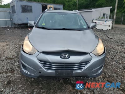 Piąte zdjęcie samochodu w środku: 2011 HYUNDAI TUCSON GLS VIN:KM8JU3ACXBU276793 - miniatura