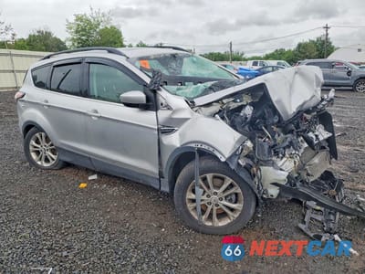 Czwarte zdjęcie samochodu z boku: 2017 FORD ESCAPE SE VIN:1FMCU0G95HUA25658 - miniatura