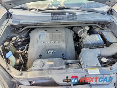 Zdjęcie 11 z 12 samochodu: 2007 HYUNDAI TUCSON SE VIN:KM8JN72D67U542510 - miniatura