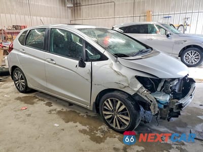Czwarte zdjęcie samochodu z boku: 2015 HONDA FIT EX VIN:3HGGK5H88FM729452 - miniatura