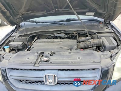Zdjęcie 12 z 13 samochodu: 2004 HONDA PILOT EXL VIN:2HKYF18534H622088 - miniatura
