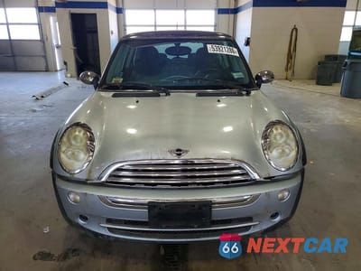 Piąte zdjęcie samochodu w środku: 2006 MINI COOPER VIN:WMWRC33506TJ74047 - miniatura