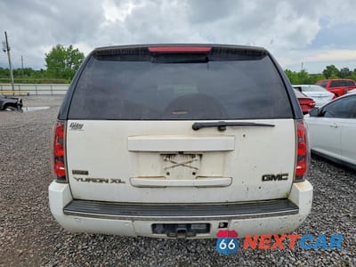 Zdjęcie 6 z 13 samochodu: 2010 GMC YUKON XL DENALI VIN:1GKUCMEF9AR189584 - miniatura